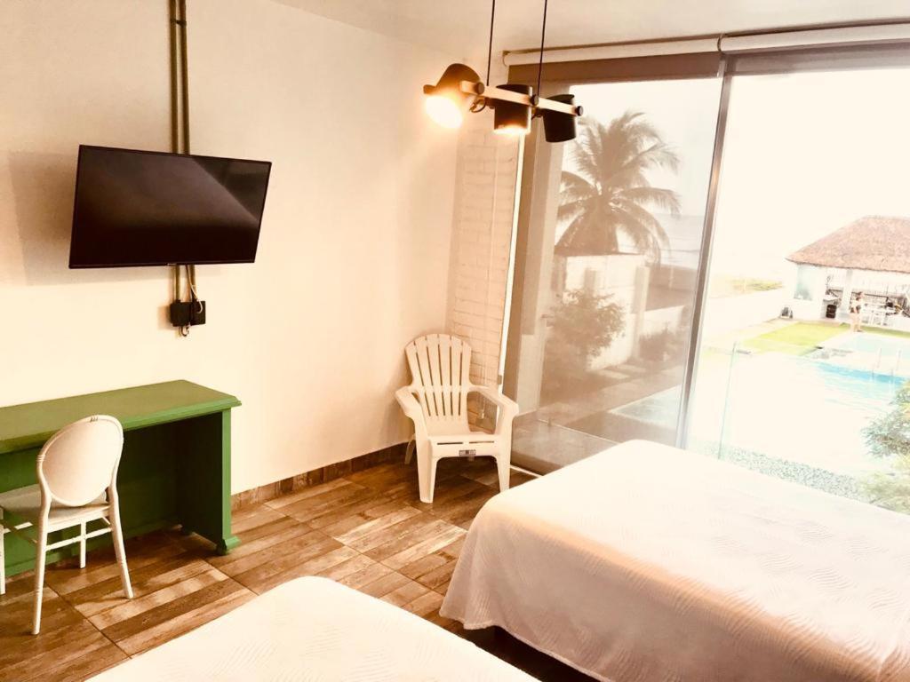 Hotel "Casa Mangata" ปูแอร์โตอาริสตา ภายนอก รูปภาพ